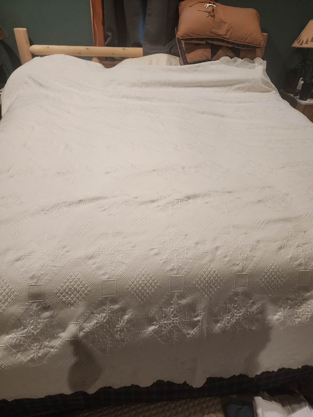 White Peacock Alley Oasis coverlet features a textured matelassé design